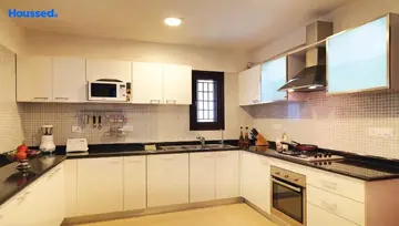 Kitchen of Adarsh Palm Retreat Villas - Image 131227